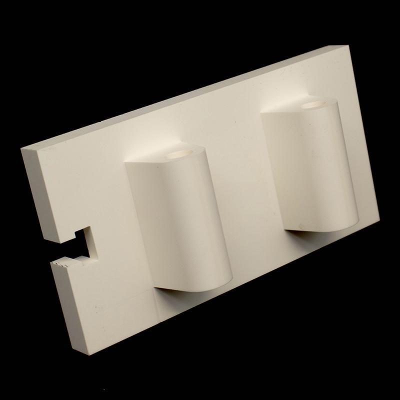 Aluminum oxide ceramic shaped part with a central protrusion and hole
