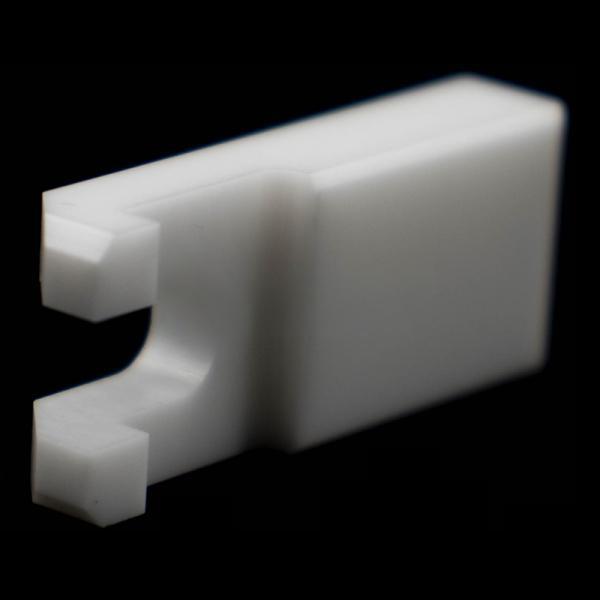 Intermediate arc-shaped ceramic structural component